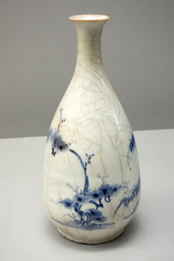 A 17th-century Imari ware sake bottle with pine, bamboo, and plum design at the Tokyo National Museum