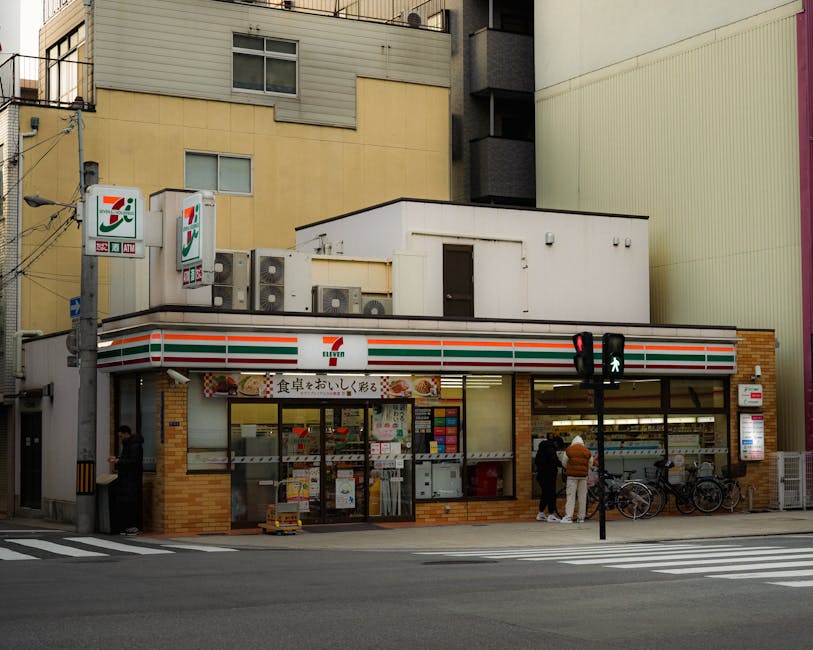 A 7-Eleven convenience store on a residential Japanese street