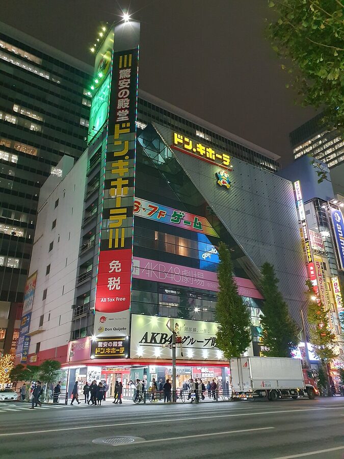 Don Quijote discount store storefront at night in Tokyo