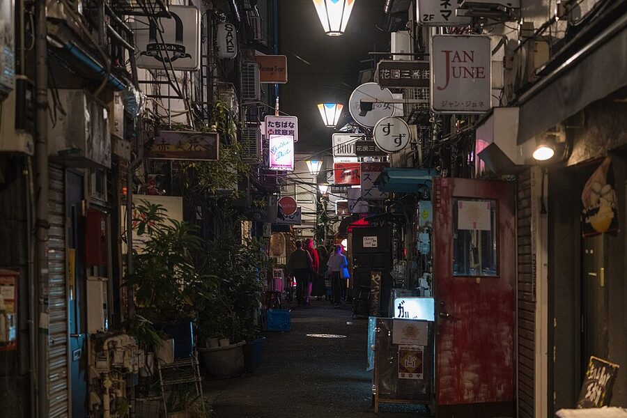 Shinjuku Golden Gai narrow alleys at night with bar signs
