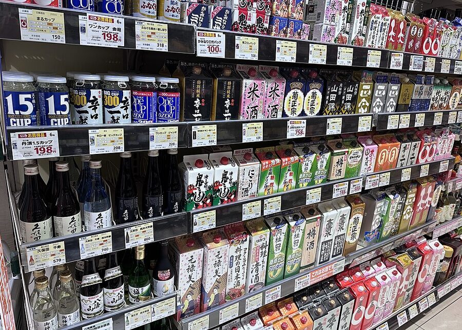 Sake bottles on display at a Japanese supermarket