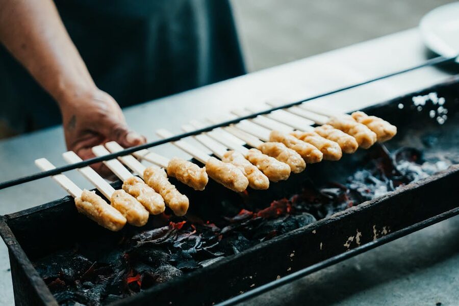 Charcoal-grilled yakitori skewers on a Japanese robata grill