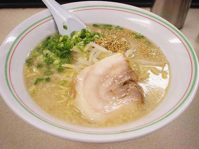 Classic bowl of Hakata-style tonkotsu ramen with chashu and green onion