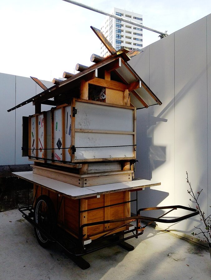 Yatai Keiji cart styled like a Shinto shrine, parked near Kego in Fukuoka