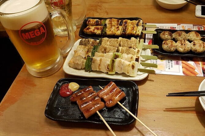 Fukuoka Evening Tours: Yatai, Izakaya, Karaoke and more - Nakasu District after dark: yatai stalls, neon streets, and nightlife stops