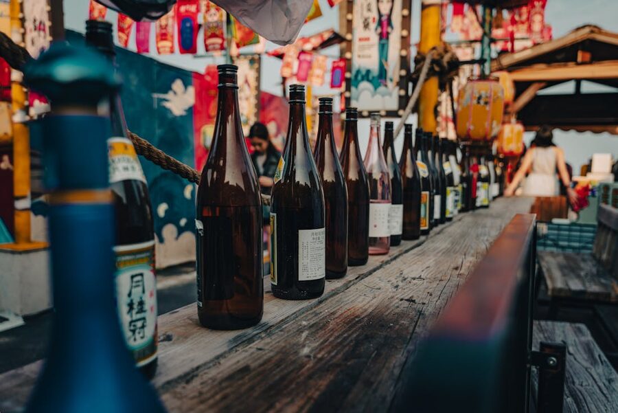 Row of sake bottles at an outdoor Japanese festival