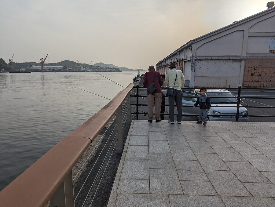 Onomichi covered shopping arcade with traditional shops and a bicycle