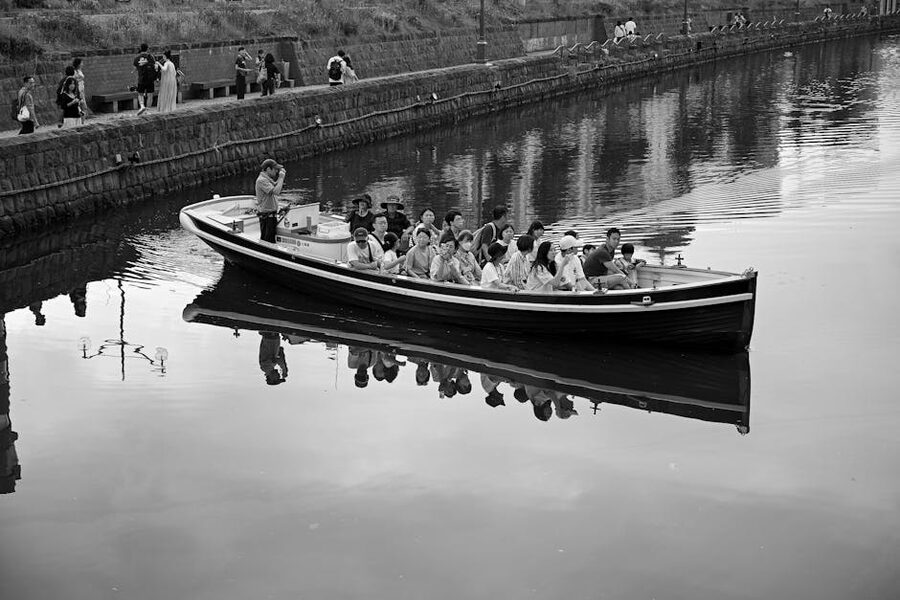 A boat with passengers on the Otaru canal