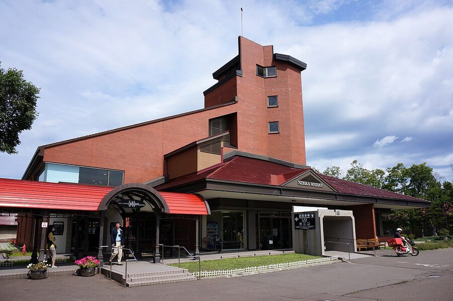 Yoichi distillery indoor tasting hall with seated visitors