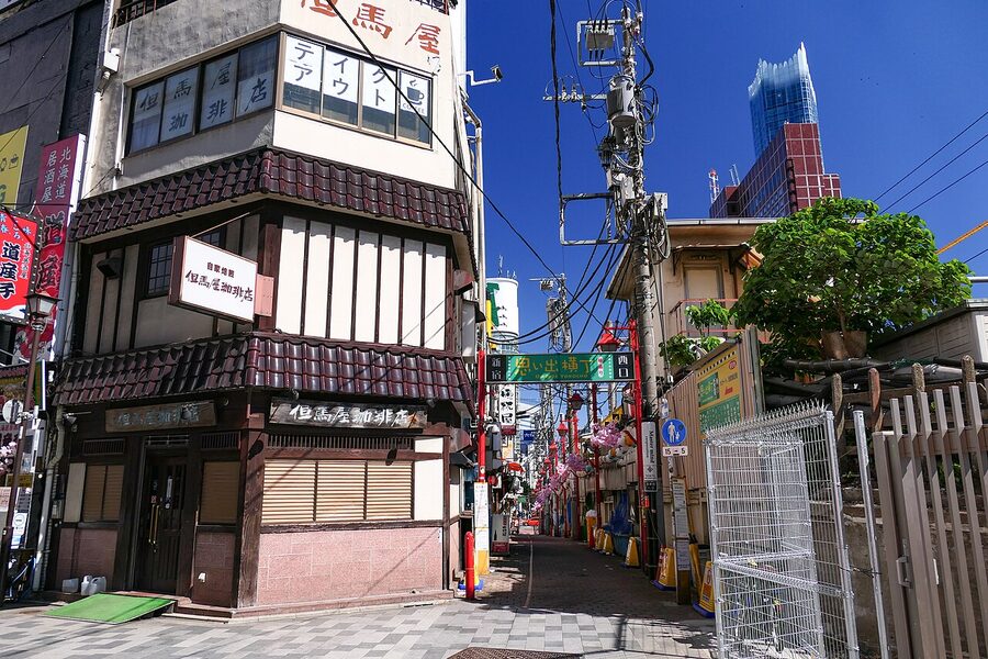 Omoide Yokocho alley in Shinjuku, Tokyo with rows of small lit-up izakaya signs