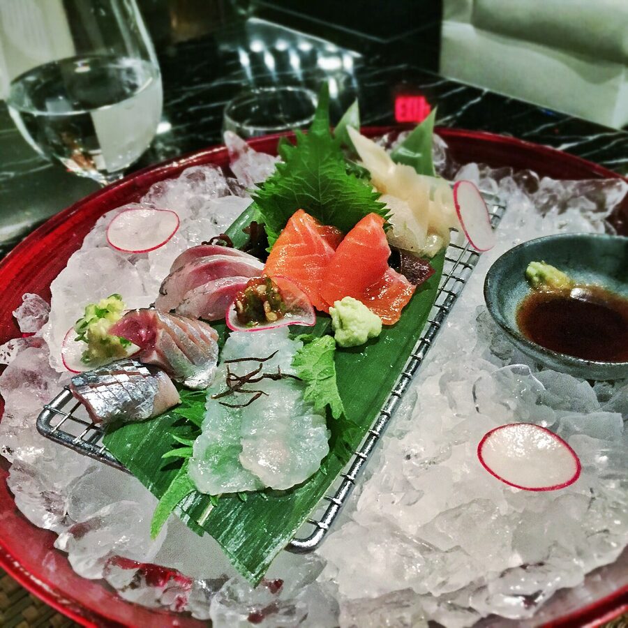 A deluxe sashimi moriawase assortment platter from Tsukiji with hirame, sanma, aji, and salmon