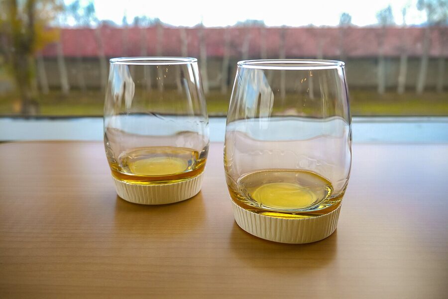 Nikka Yoichi distillery tasting room with whisky pours arranged on the counter