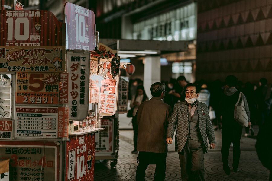 Shinjuku Kabukicho neon signs at night with crowds of people