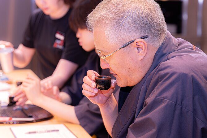 Japanese Sake Tasting & Wagyu Sukiyaki Cooking Class in Tokyo - Sake tasting with temperature changes and pairing snacks