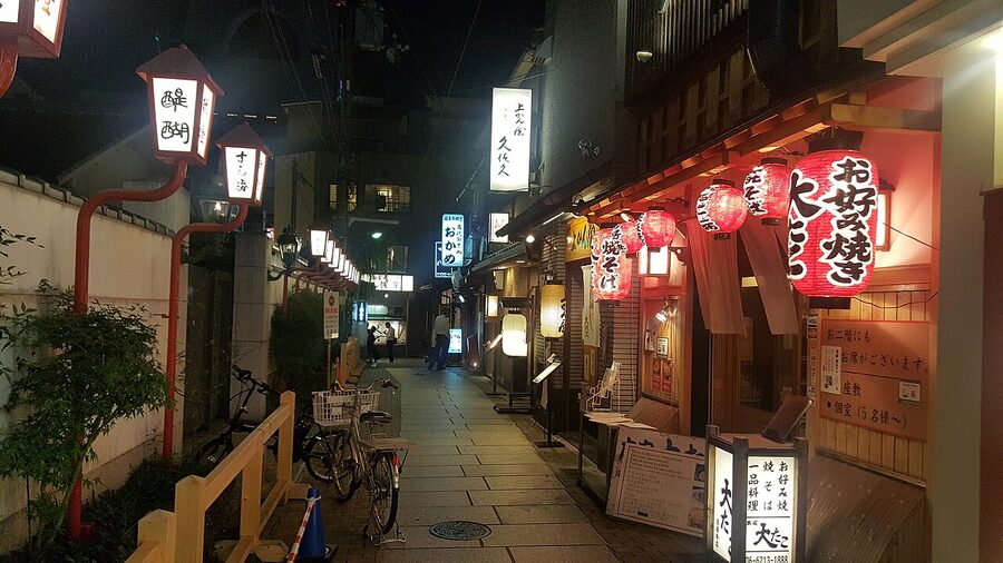 Hozenji Yokocho stone-paved alley at night in Osaka with hanging lanterns