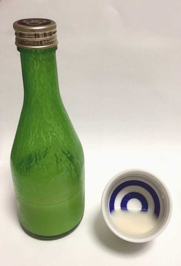 Nigori sake bottle and ochoko cup