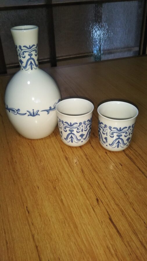 A ceramic tokkuri sake bottle