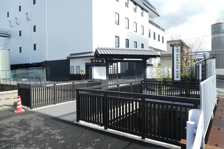 Kizakura Fushimigura sake brewery facility with traditional black wooden walls