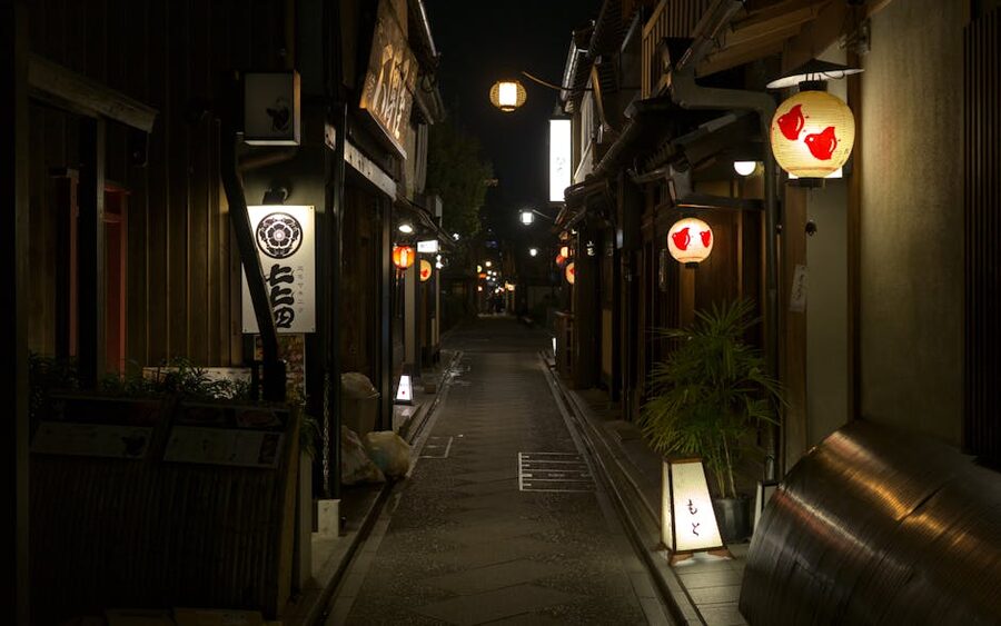 Pontocho alley with traditional Japanese lanterns at night