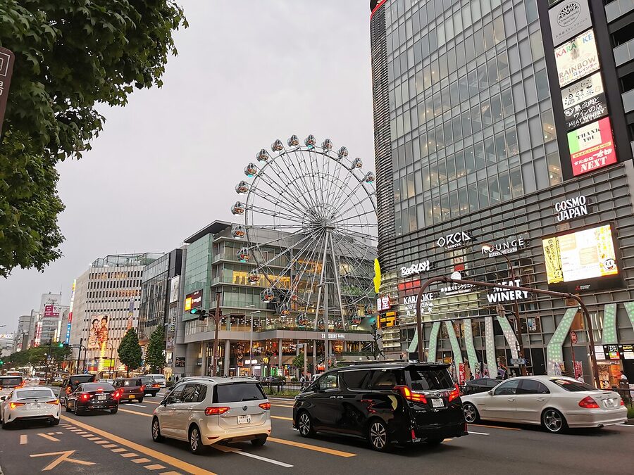 Otsu-dori avenue in Sakae, Nagoya at night with bar signage
