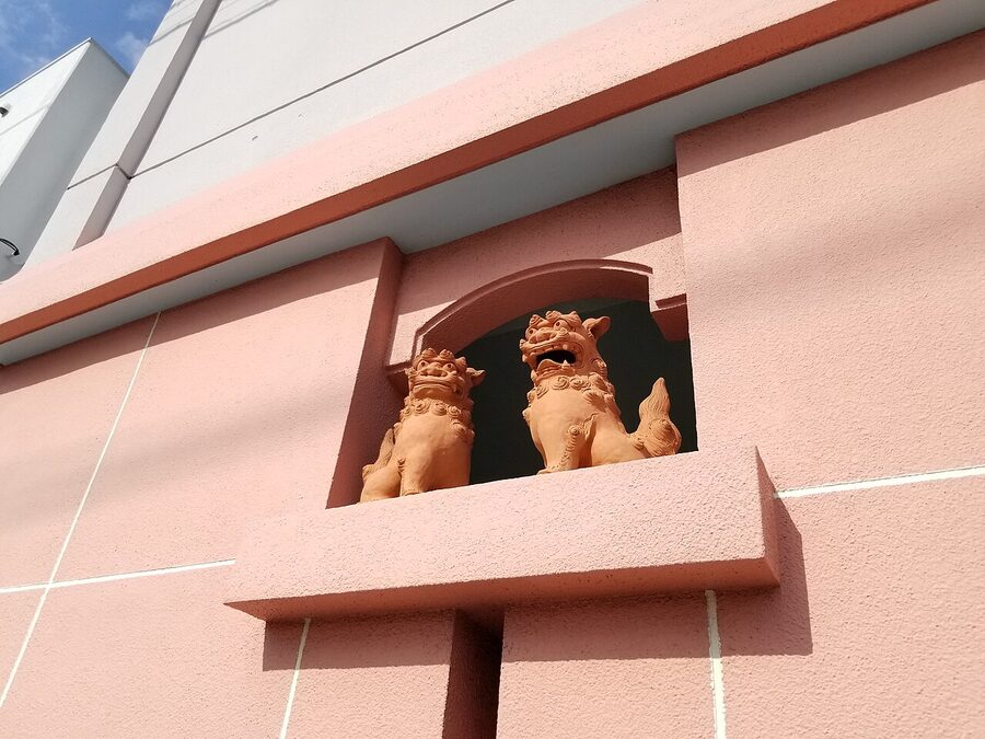 Shisa lion-dog statue on a Naha wall