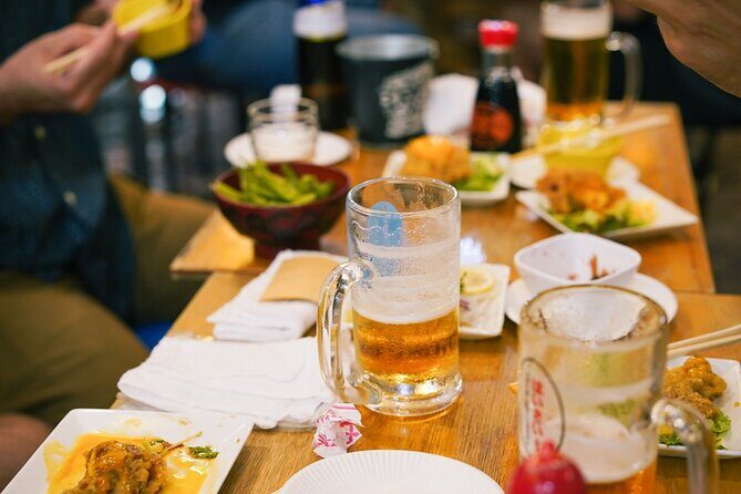 Okinawa Bar Hopping Tour with Sanshin Live in Music Town Koza - Stop 1: Ichibangai Shotengai toast and izakaya comfort food