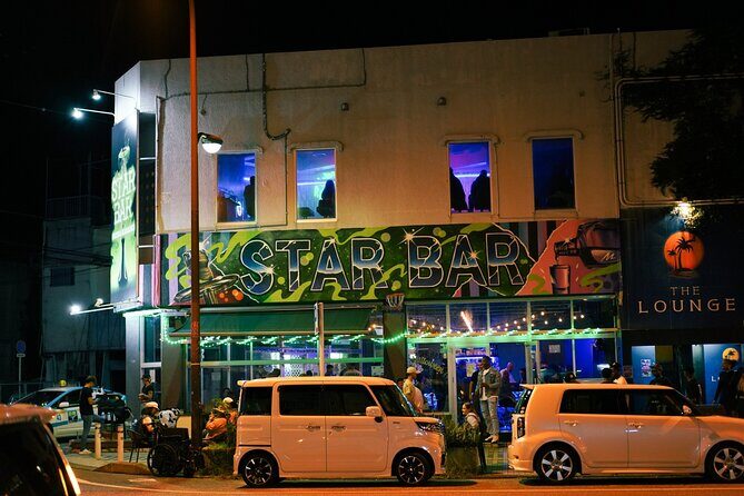 Okinawa Bar Hopping Tour with Sanshin Live in Music Town Koza - Stop 2: Nakanomachi bar hop with Okinawan food and guide stories
