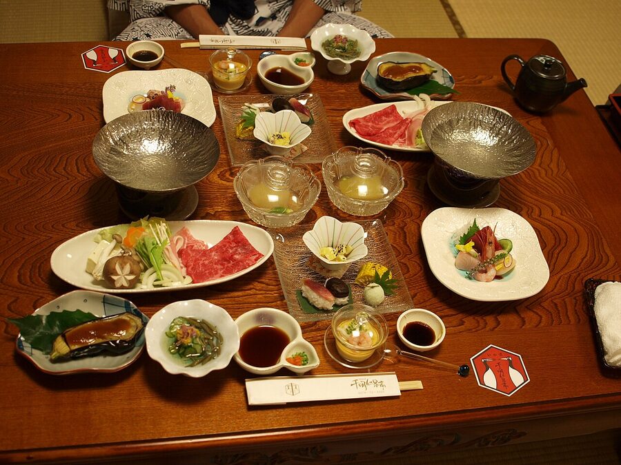 Ikaho ryokan kaiseki dinner spread on a low table