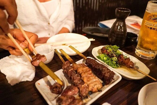 Osaka Bar Hopping Night Walking Tour in Namba (3 bars, 6 tastes) - Namba at night: a route that mixes alley food with big-city icons
