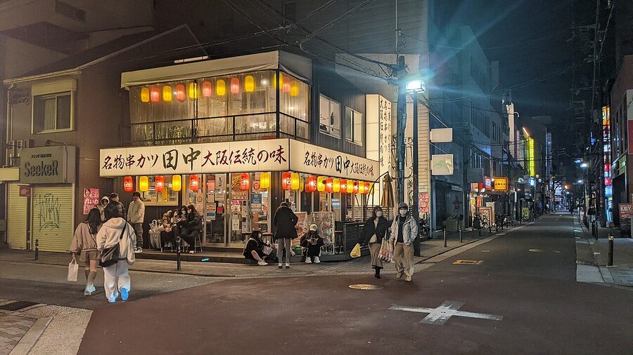 Kushikatsu Tanaka shop frontage in Osaka with red lanterns and signage