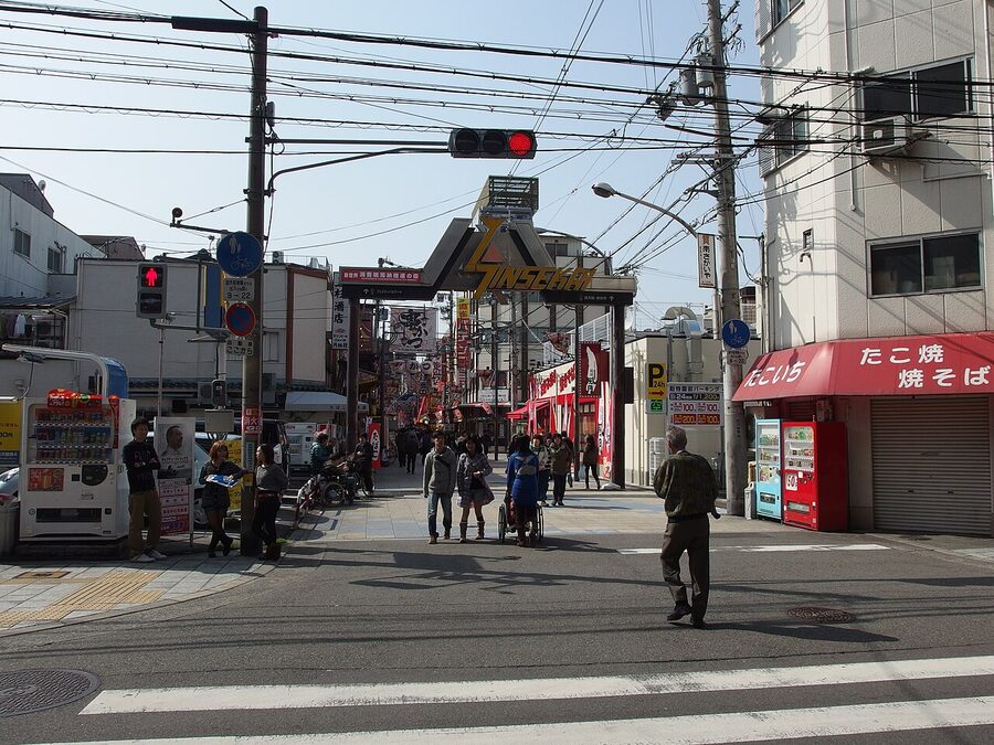Shinsekai streets in Osaka with billboard signs, lanterns and vintage shopfronts