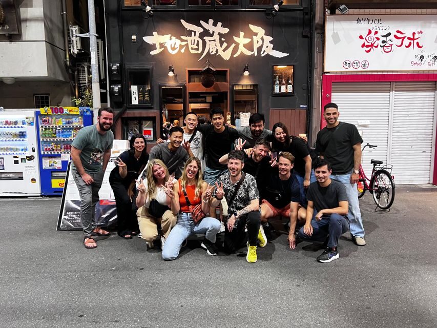 Osaka: Izakaya Bars Guided Walking Tour - Meeting at the Glico area: start where Osaka feels loud and instant