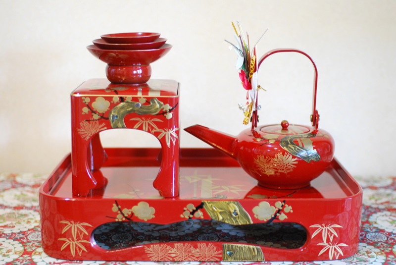 A small lacquer cup of otoso poured for New Year's Day in Japan