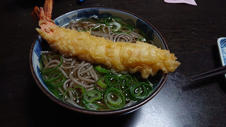 A bowl of toshikoshi soba with tempura ebi, eaten on New Year's Eve in Japan