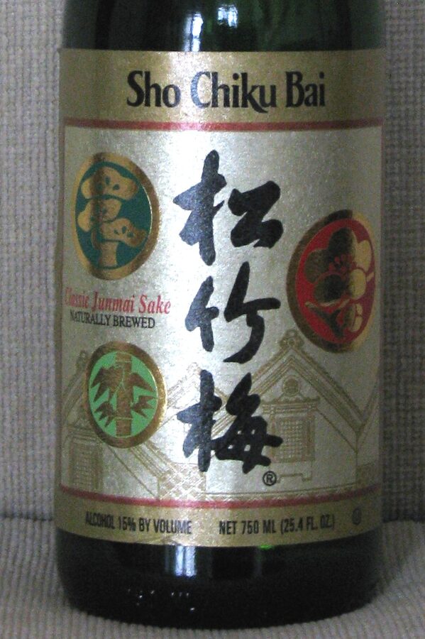 Close-up of a Japanese sake label showing kanji and printed details