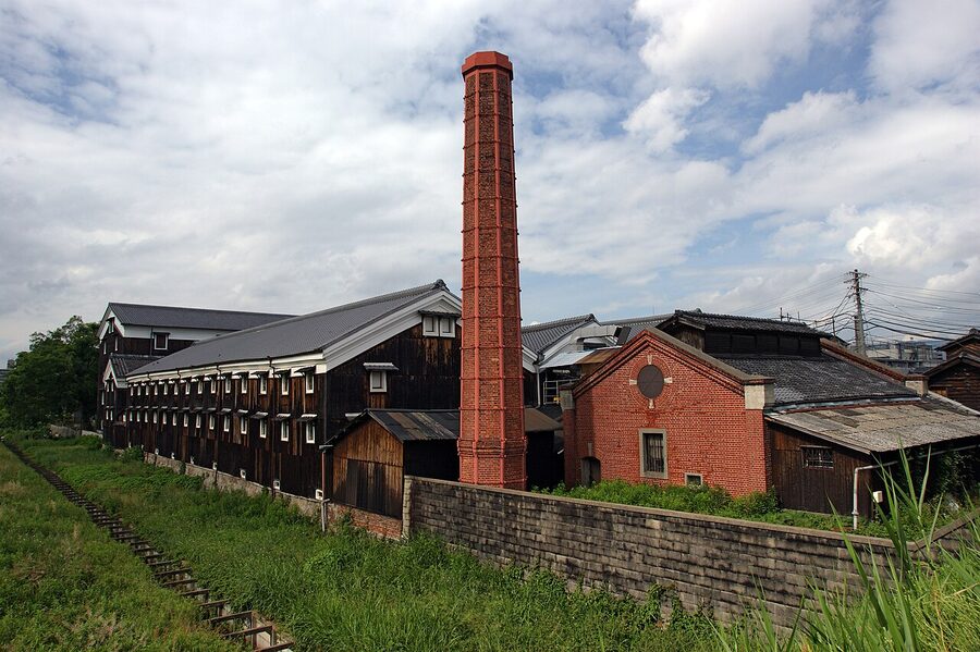 Matsumoto Sake Brewing white plaster warehouse in Fushimi, Kyoto