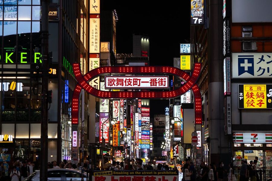 Kabukicho street at night with crowds and neon