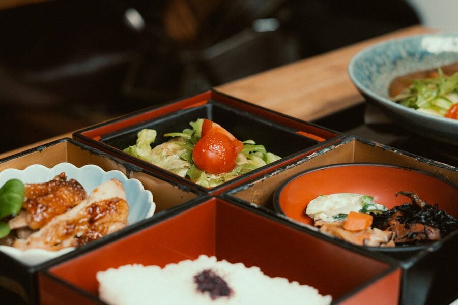 A Japanese bento box with multiple compartments