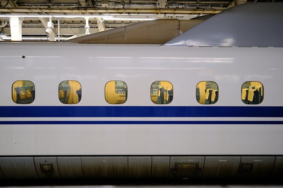 Interior of a shinkansen carriage with the window seat view