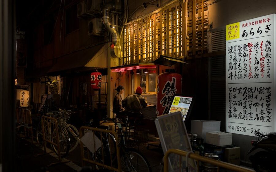 Atmospheric night scene in an Osaka izakaya alley