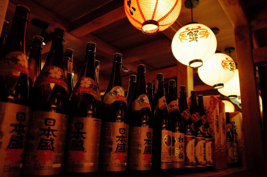 Japanese shochu bottle next to a paper lantern