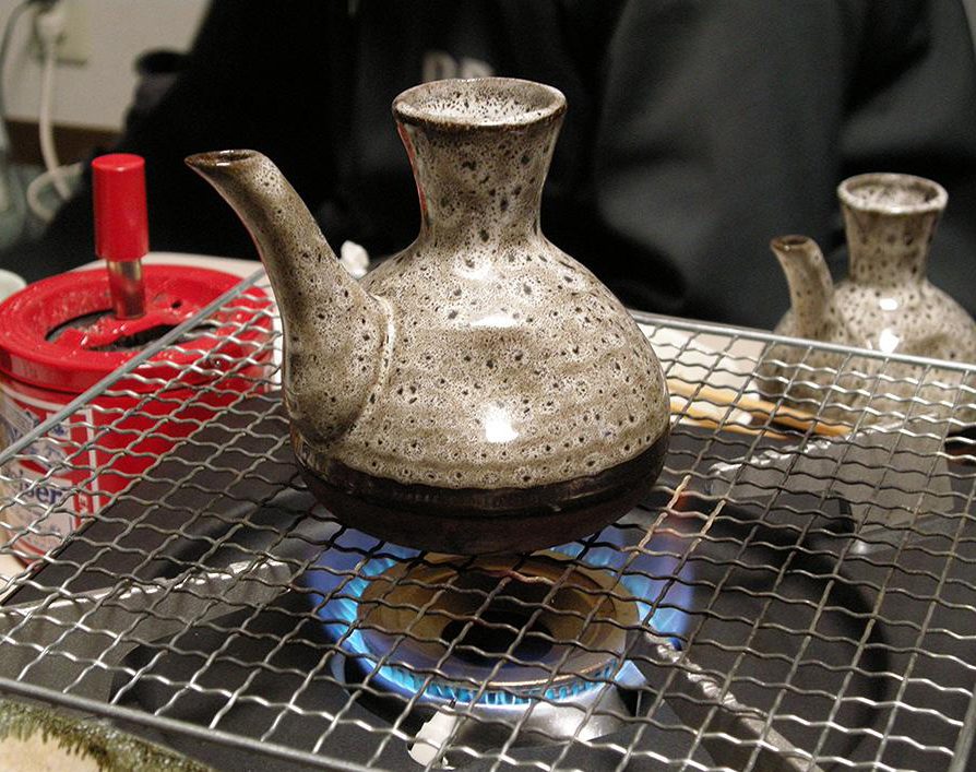 Kanzake warm sake being served