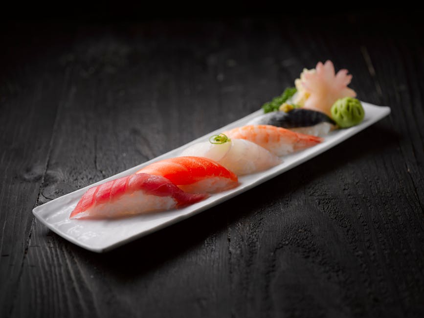Elegant sushi platter on dark wood