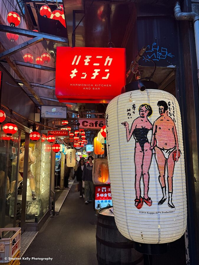 Red lanterns lit at a Harmonica Yokocho stall in Kichijoji
