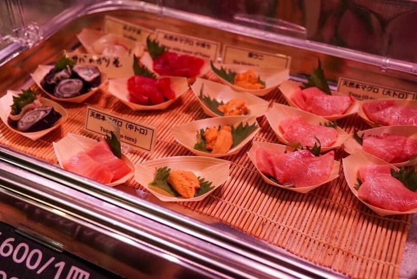 Tokyo: Private Tsukiji Street Food & Sake with Local Guide - Starting at Tsukiji Hongwan-ji: where the tour tone gets set