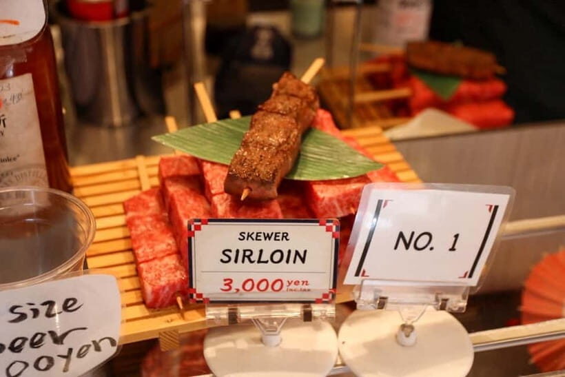 Tokyo: Private Tsukiji Street Food & Sake with Local Guide - Tsukiji Hongwan-ji to sake: how the tour connects food and story