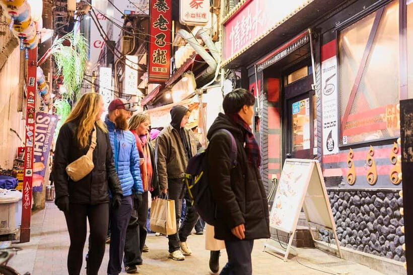 Tokyo: Shinjuku Nightlife & Secret Backstreets Walking Tour - Rain or shine: how to dress so the tour stays fun