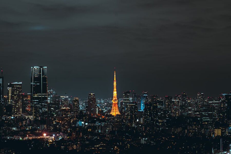 Night view of Tokyo skyline with illuminated Tokyo Tower
